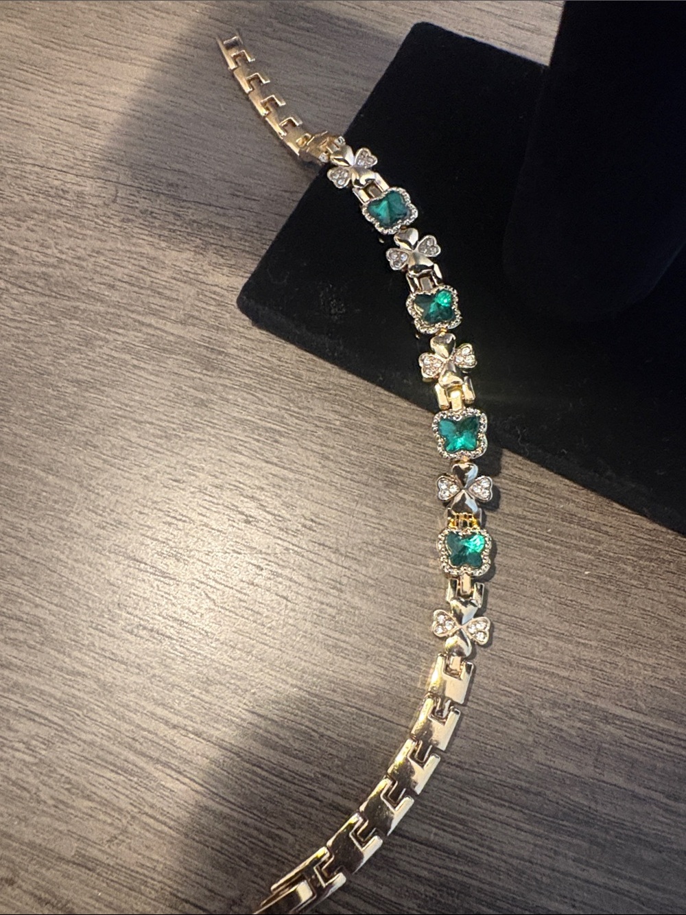 Gold-Tone Bracelet with Emerald Green Stones and Clear Accents